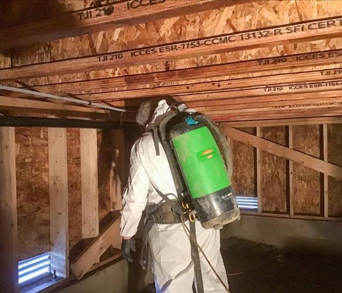 SERVPRO tech in PPE checking for mold in Auburn, WA